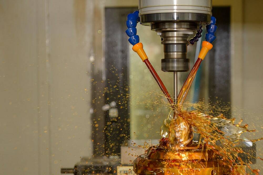 Honing oils being applied to metal
